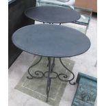 METAL TABLES, a pair, oval on scrolled supports, 68cm H x 65cm x 43cm.