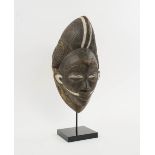 PUNU MASK FROM GABON, carved wood with painted highlights,