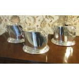 WINE COOLERS, a set of three, silver plated to hold one bottle each 25cm W x 20cm H.