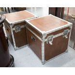 TRUNKS, a pair, in tanned leather with chromed metal edging, 52cm x 52cm x 52cm H.