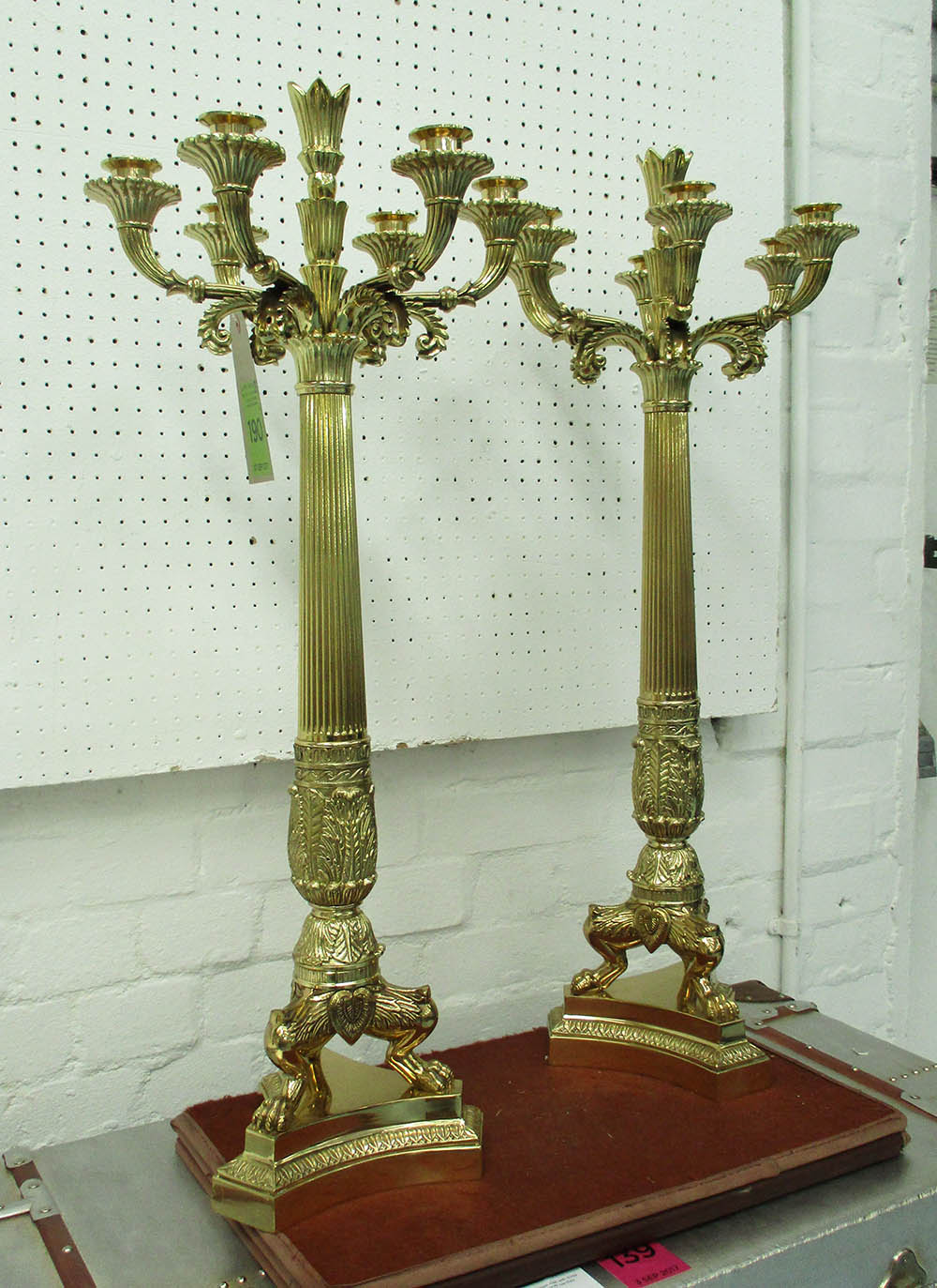 CANDELABRAS, a pair, seven branch, Empire style in brass finish, 79cm H.