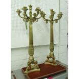 CANDELABRAS, a pair, seven branch, Empire style in brass finish, 79cm H.