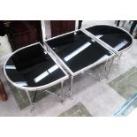 CENTRE TABLE, in three sections, black top on plated frame 'D' ends, 139cm x 50cm x 44cm H.