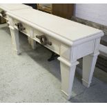 CONSOLE TABLE, of substantial proportions, cream with two drawers and feature handles,