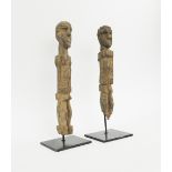 LOBI COUPLE FIGURES, two similar carved wood, from the Batie region of Burkina Faso,