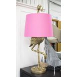 FLAMINGO TABLE LAMP, with pink shade in gilded resin finish.