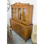 SIDEBOARD WITH A PAIR OF CUPBOARDS, on an ornate frame,