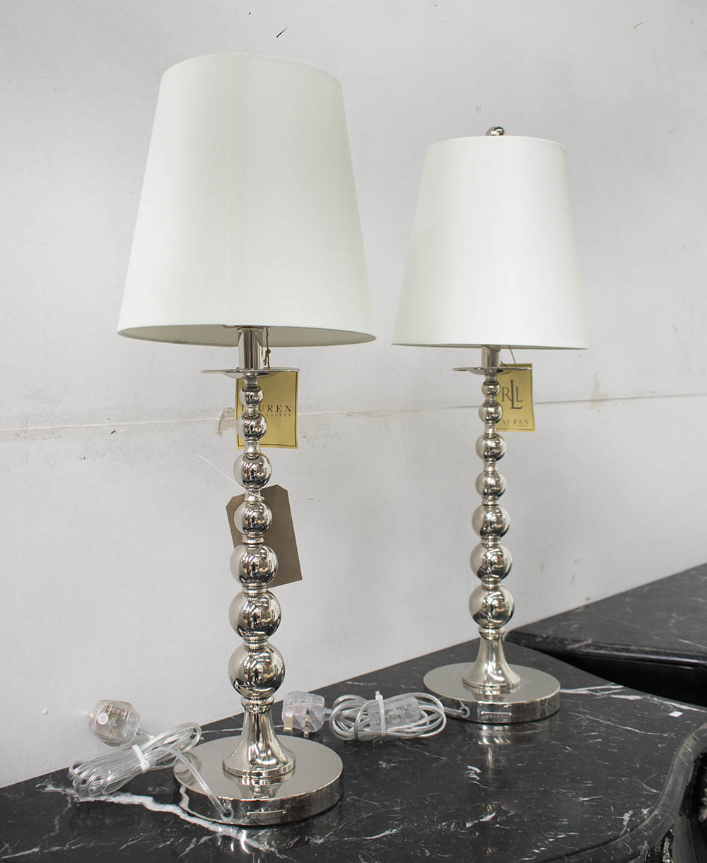 TABLE LAMPS, a pair, Ralph Lauren style in chromed metal with shades, 74cm H.