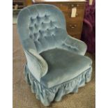 NURSING CHAIR, Victorian French blue plush velved and button upholstered with turned front supports,