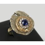 GOLD DRESS RING, of naturalistic design set sapphire and diamonds.