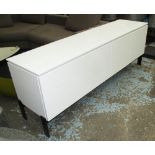 CODA SIDEBOARD BY ROCHE BOBOIS, in white melamine with four door on black end supports,