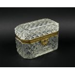 CUT GLASS CASKET, late 19th century French with gilt bronze mounts, 17cm W x 7cm D x 11cm H.