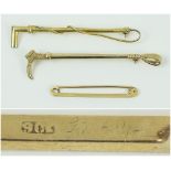 9CT GOLD BAR BROOCH, and two others modelled as riding crops.