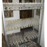 SUITE OF DRINKING GLASSES, with fluted bowls and gilt rims, comprising twenty four red wine 14cm H,