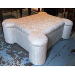 HEARTH STOOL, of large proportions with a buttoned top and cream and gold patterned upholstery,