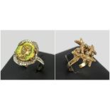 DESIGNER GOLD RINGS, of abstract form, set diamonds.