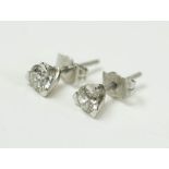 DIAMOND STUD EARRINGS, a pair, platinum set.
