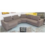 CORNER SOFA BY ROLF BENZ, in brown fabric on metal tubular supports, 274cm x 315cm.