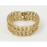 GOLD LINK BRACELET, of multiple line and ball design, clasp stamped 14k, 21cm L, total weight 60g.