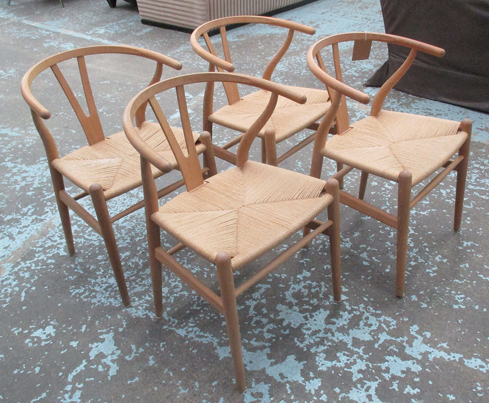 WISHBONE CHAIRS, a set of four, by Carl Hansen and Son, as designed by Hans J Wagner 1949,