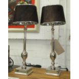 TABLE LAMPS, a pair, column type in plated metal with animal skin shades.