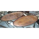 OVAL TRAYS, a pair, in bronzed finish, 68cm x 33cm.