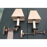 WALL READING SCONCES, a pair, adjustable arms with shades, each 30cm H.