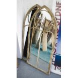 GARDEN MIRRORS, a set of three, Gothic style arch metal frame, 56cm x 122cm H.