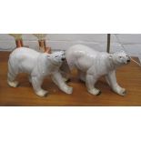 POLAR BEARS, a pair, ceramic with cream glaze, 33cm L.