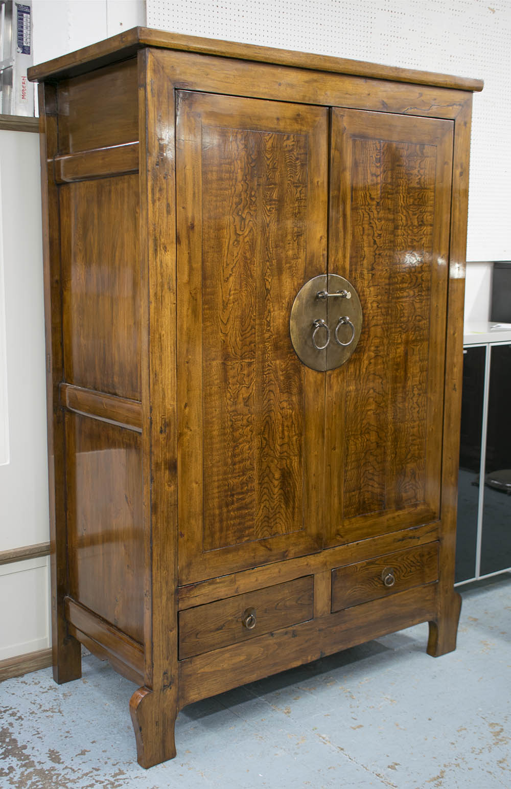 MARRIAGE CABINET, Chinese elm of two doors enclosing shelves with two drawers below,