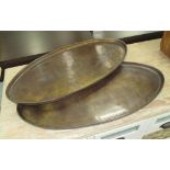 TRAYS, a pair, bronze oval.