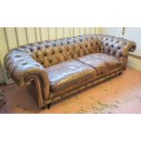 CHESTERFIELD SOFA, in buttoned brown leather, 105cm D x 235cm W x 75cm H.