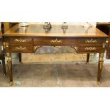 BUREAU PLAT, Empire style mahogany and gilt metal mounted, with five drawers (one fitted),