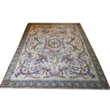 SAVONNERIE DESIGN CARPET, 325cm x 245cm, ivory field decorated with polychrome floral medallion,