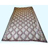 VINTAGE BEN OURIAN CARPET, 360cm x 190cm, charcoal and terracotta diamond pattern on ivory field.