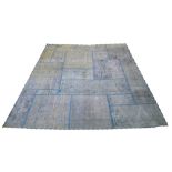 PERSIAN KIRMAN PATCHWORK CARPET, 235cm x 180cm, in shades of blue.