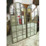 ARCHITECTURAL STYLE GARDEN MIRRORS, a set of three, verdigris metal framed with an arched top,