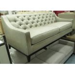 SOFA, buttoned back with sloping arms in shimmering fools gold coloured upholstery,