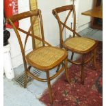 DINING CHAIRS, a set of six, bentwood style with cross splats and woven seats.