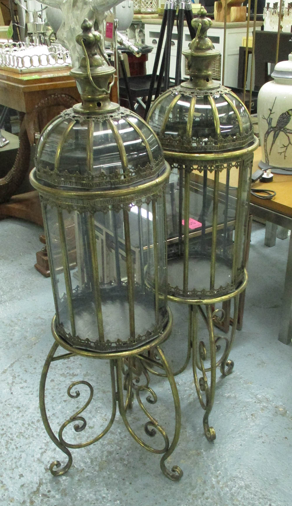 GARDEN LANTERNS, a pair, large size on stands, gilt metal.
