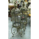 GARDEN LANTERNS, a pair, large size on stands, gilt metal.