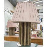 LAMPS, a pair, rustic wooden bases, with pleated linen shades, 82cm H.