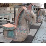 ASIAN CHILD SEATS, a pair, carved and painted wood, in the form of horses, each 69cm H.