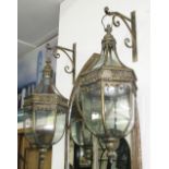 WALL LANTERNS, a pair, of globe form with metal with wall brackets.