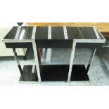 CONSOLE TABLE, with black lacquered top and under shelf drawer to middle on a chromed metal frame,