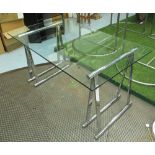 DESK, rectangular glass top on chrome twined supports, 142cm L x 80cm W x 73cm H.