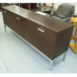 SIDEBOARD, by Cappellini, three doors on polished metal base, 46cm D x 79cm H x 210cm W.