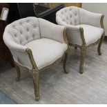 BEDROOM CHAIRS, a pair, in neutral buttoned fabric, French style on turned castor supports, 62cm W.