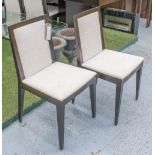 DINING CHAIRS, a set of eight, by Kesterport cream seats and wooden showframes,