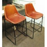 BAR STOOLS, in the 1920s manner, in tanned leather on metal tubular supports.